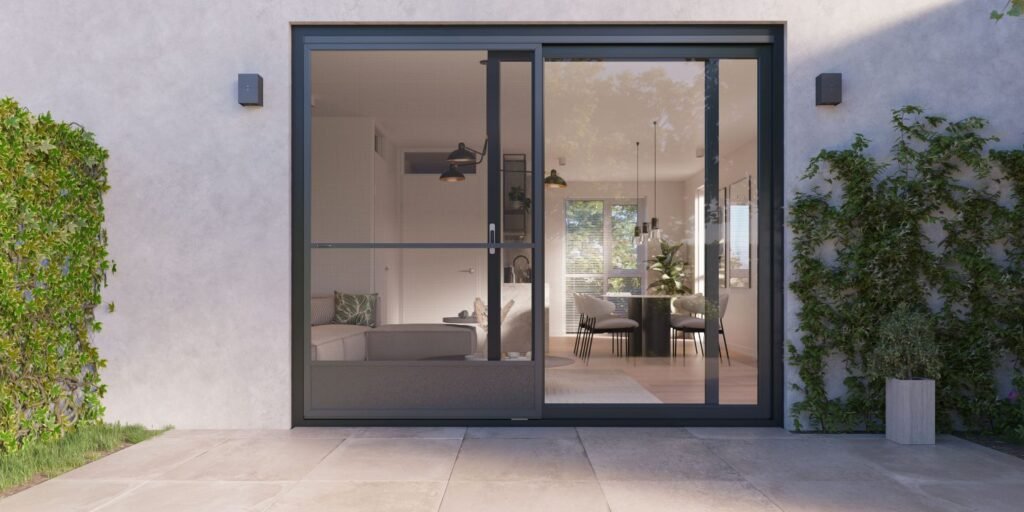 Kunststof schuifpui Grootebroek met uitzicht op een moderne tuin